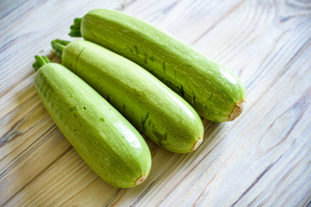 Vegetable harvest: fresh cucumbers, squash and zucchini