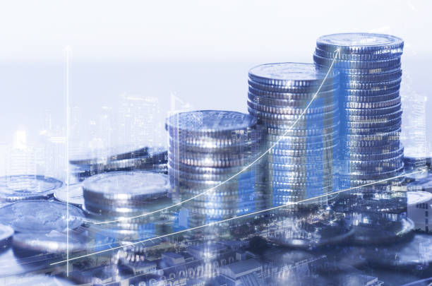 istock double exposure many coins stack with growth graph and chart and city background. business financial banking and money saving concept. 1220992118