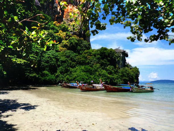 istock thai heavenly beach and boats 1220992456