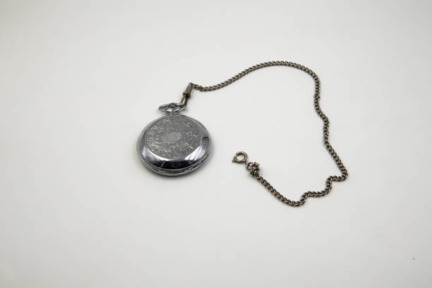 istock silver pocket watch isolated 1220995915