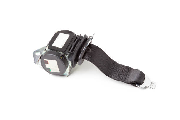 istock Three-point seat belt with a black plastic inertia coil, stops and a lock is a protection system that works when a car collides or during an accident. Spare parts for car repair or for sale in service 1220996324