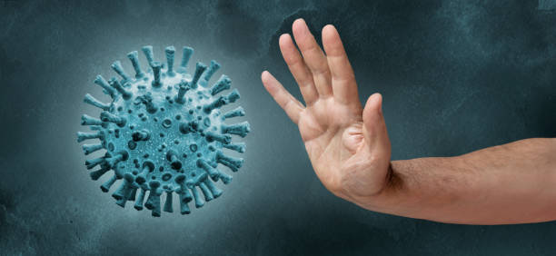 istock Human hand stopping COVID-19 Coronavirus 1220997725