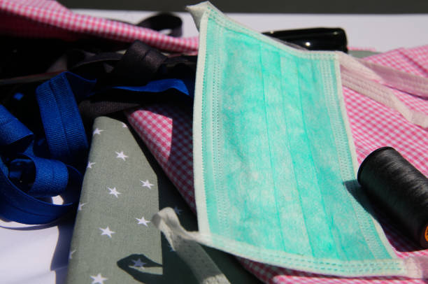 istock View on accessories for self-made protection face mask: cloth, yarn and elastic bands 1220998781