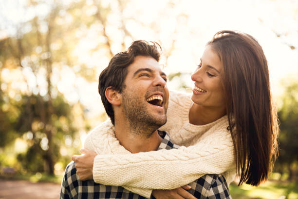 istock Happy couple laughing 1221002208