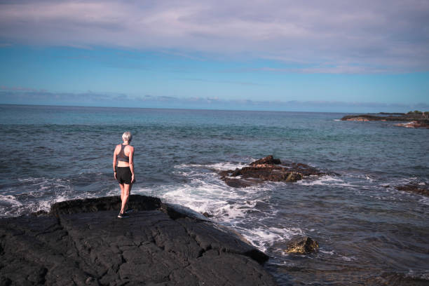 Caucasian senior woman looking at ocean