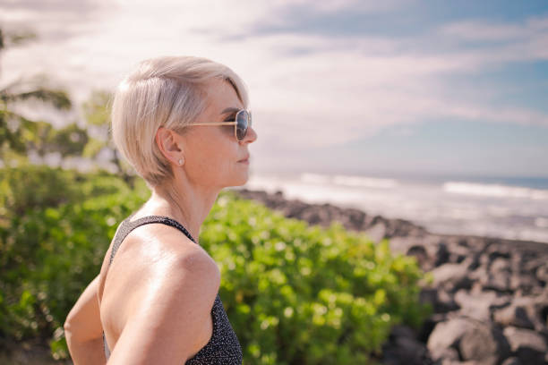 istock Caucasian Senior Woman Looking at Ocean 1221005664