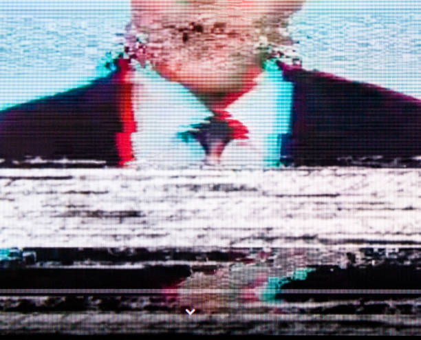 Man in a suit on the screen. Glitch. Man in a suit on the screen. Broadcaster. Glitch. Digital errors on the screen. big brother orwellian concept stock pictures, royalty-free photos & images
