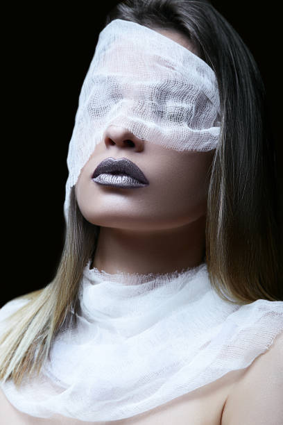 istock The sheer face patch of a gorgeous brunette with dark make-up. 1221019683