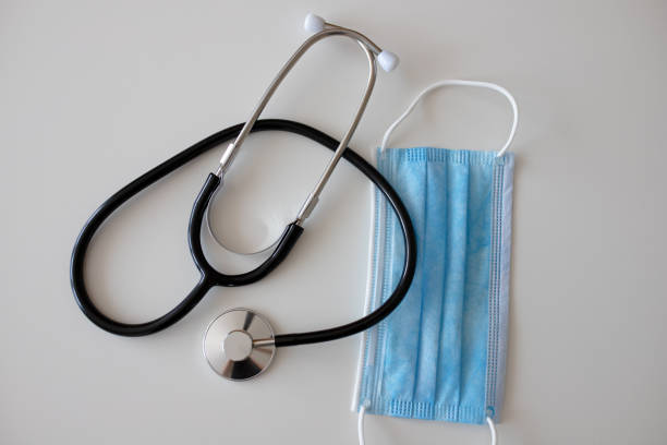 istock Masks and stethoscope on white background 1221020993