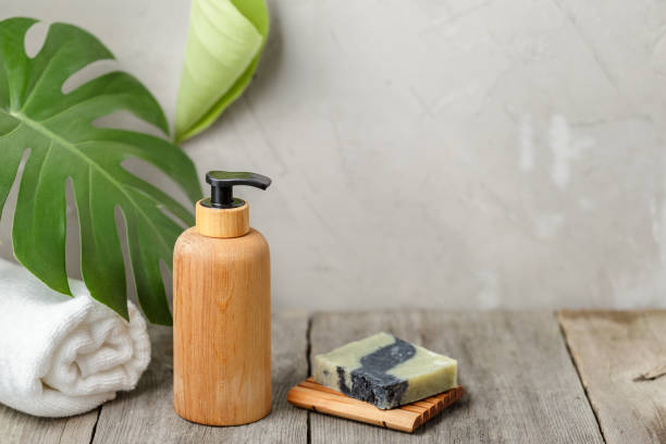 istock Wooden pump soap bottle and solid soap dish 1221021405