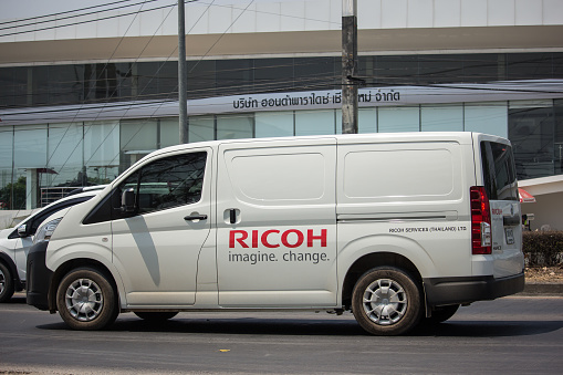 Chiangmai, Thailand - March  24 2020: Toyota commuter van Ricoh Company. Photo at road no.121 about 8 km from downtown Chiangmai thailand.