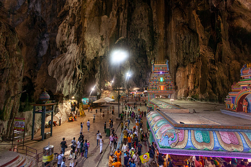 Amazing Batu caves with hindu temple and lots of pilgrims and tourists