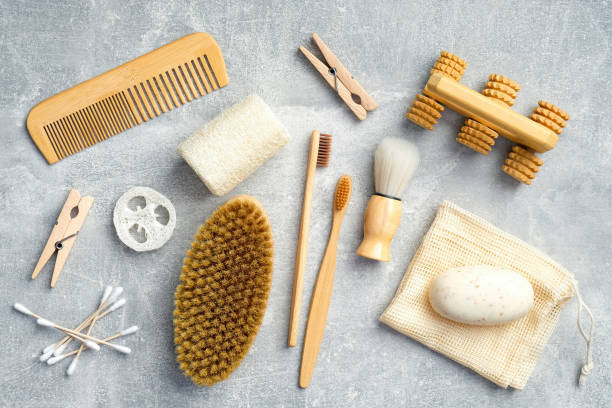istock Eco-friendly personal hygiene products and bath accessories on stone background. Flat lay, top view. SPA treatment at home, body care concept 1221025638