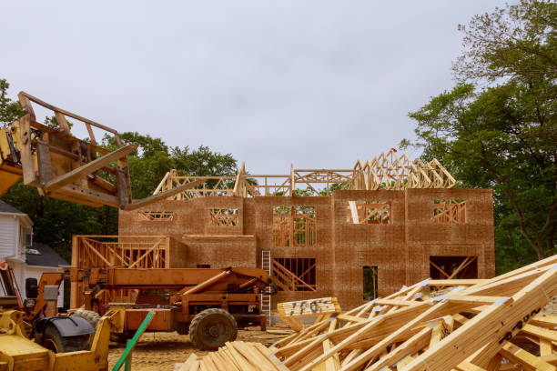 istock Private residential house with wooden frame under construction house 1221027265