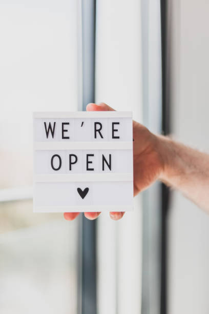 istock End of quarantine. Greeting message We're open 1221032237