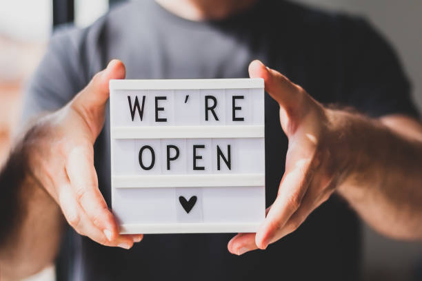 istock End of quarantine. Greeting message We're open 1221032338