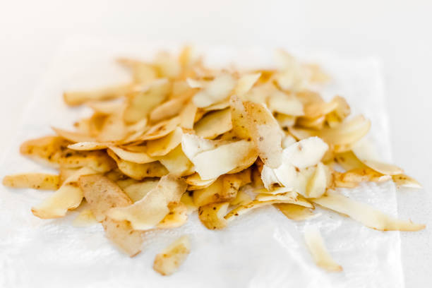 Organic home cooking food waste ready to compost. Ecological concept. Food leftovers, Vegetable Peelings on kitchen table. Environmentally responsible behavior, waste management, recycling garbage.