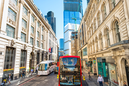 London, UK - June 22, 2018: Wide angle view of Gracechurch street road in Bishopsgate center of downtown financial district city with old architecture, red double decker bus