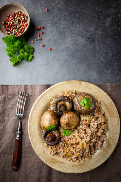 istock Buckwheat porridge with mushrooms 1221036295