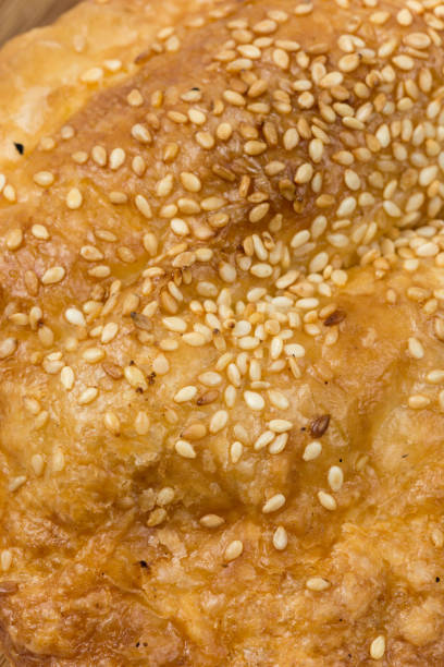 istock Close macro view of sesame on the pastry 1221036373