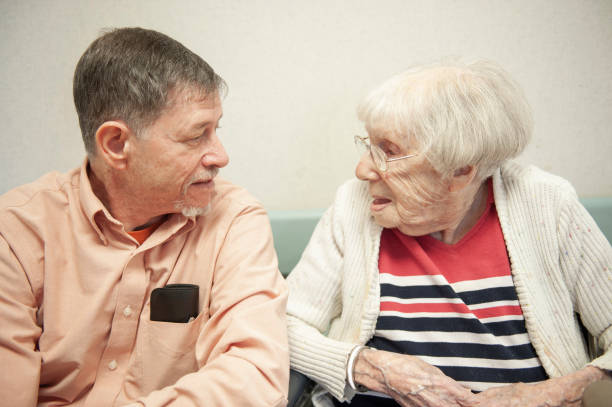 istock Senior Man Talking With 105-year-old Aunt 1221040489