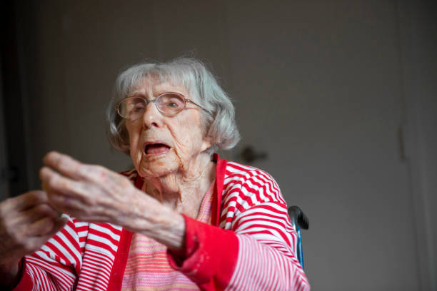 istock 106-year-old Centenarian reaches out with hands 1221040565