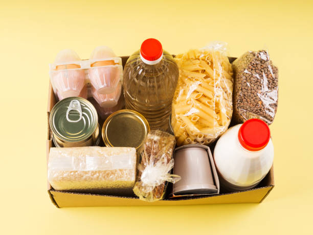 istock Food staples delivery or donation box concept 1221056819