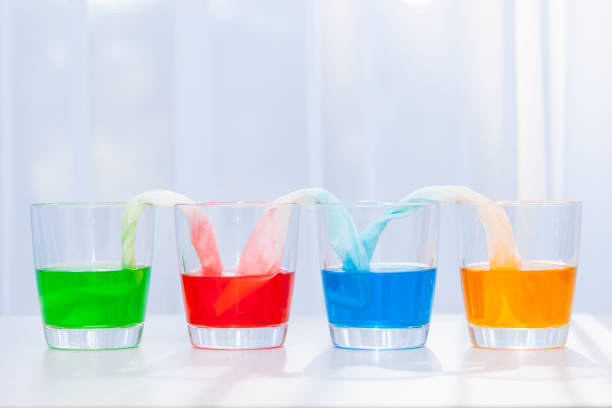 istock Glasses with colored liquid. Chemical experiments for children. 1221056903