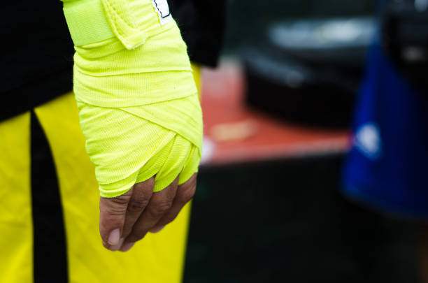 istock Boxer bandages around their arms ready to fight. 1221057113