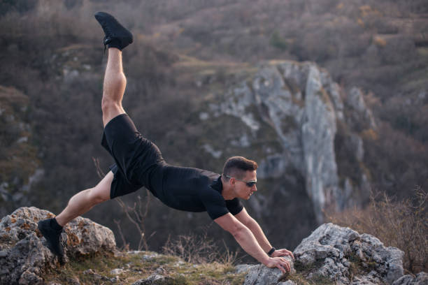 istock Exercise on top of the mountain 1221060220