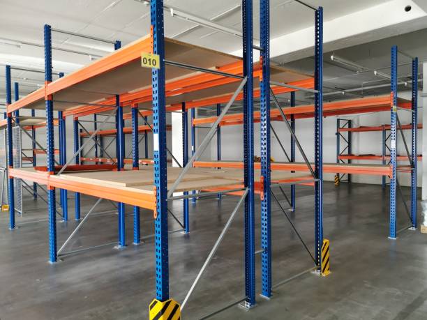 istock empty heavy duty racks in a company as production is at a standstill 1221061417