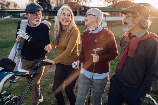istock Group of seniors gathering for a golf match 1221063799