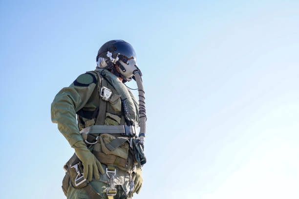 istock Pilot with suit and military air. Fighter pilot portrait posing 1221075977