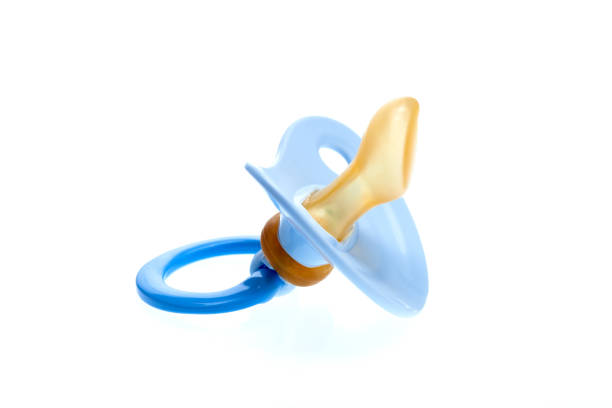 istock a blue pacifier for boy made of soft silicone  isolated on white background, nobody. 1221080026