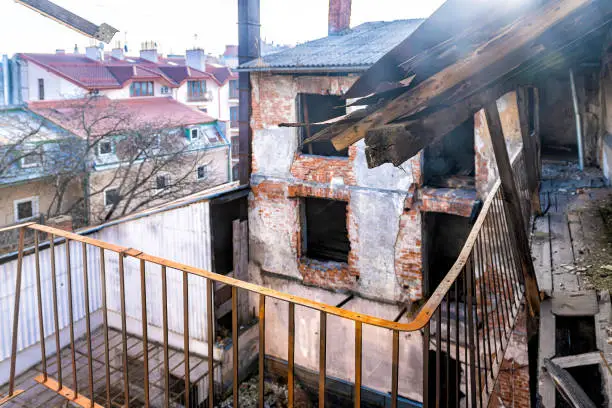 Lviv Ukraine old run-down derelict apartment houses with balcony windows rooftop view of abandoned architecture in winter