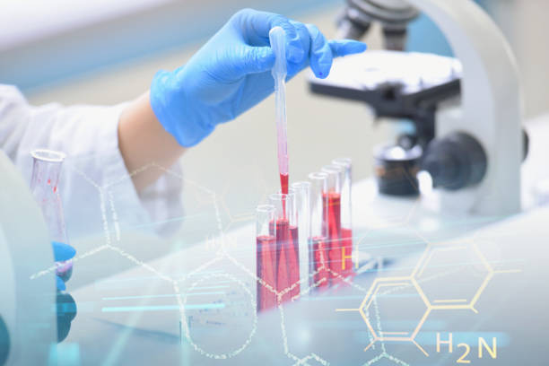 istock Young female Laboratory scientist working at lab with test tubes and microscope, test or research in clinical laboratory.Science, chemistry, biology, medicine and people concept. 1221083495