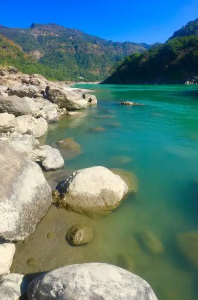 Beautiful view of the clear Ganga river in Rishikesh, India