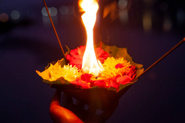 istock Aarti ceremony flowers with fire in Ganga river 1221091761