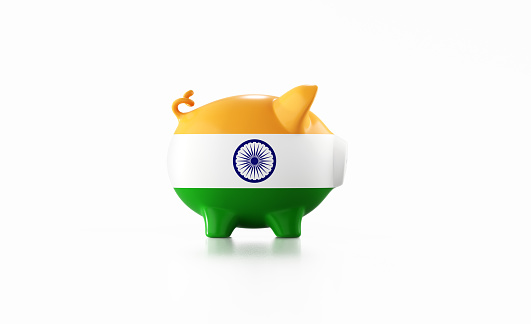 Piggy bank textured with Indian flag isolated on white background. Horizontal composition with copy space. Clipping path is included. Great use for savings concepts.