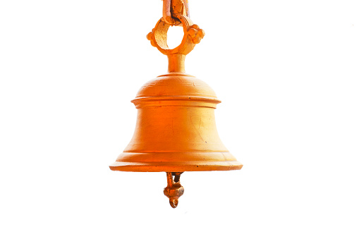 Golden bell isolated on the white background