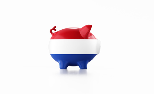 Piggy bank textured with Dutch flag isolated on white background. Horizontal composition with copy space. Clipping path is included. Great use for savings concepts.