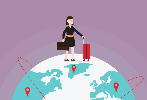 istock Businesswoman with luggage stands above the globe 1221096419