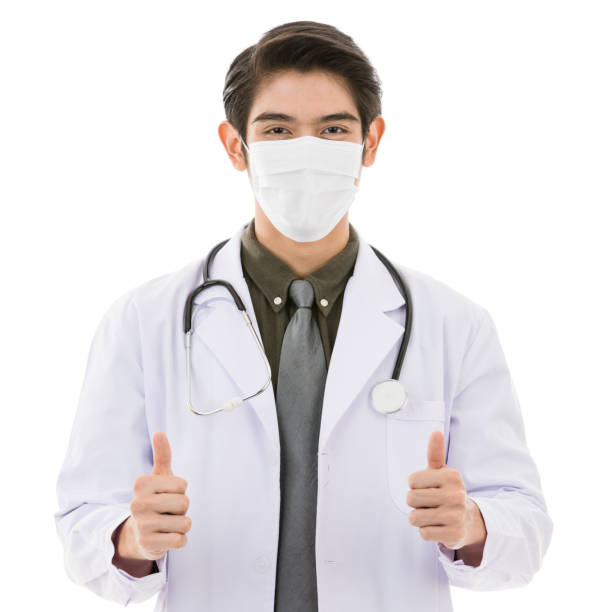 istock Young Asian man in lab coat in white background 1221099599