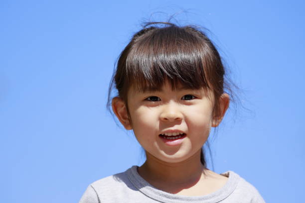 istock Japanese girl under the blue sky (5 years old) 1221104154