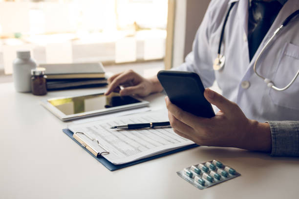 istock Asian doctor using the tablet explaining the patient condition and the treatment result. 1221109653