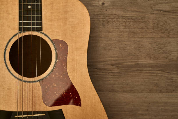 istock Acoustic guitar on a wooden floor 1221115028
