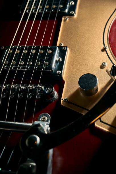 istock Red electric guitar body with a tremolo bar 1221115036