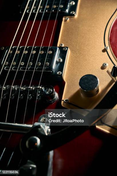 Red Electric Guitar Body With A Tremolo Bar Stock Photo - Download Image Now - Early Rock & Roll, Electric Guitar, Angle