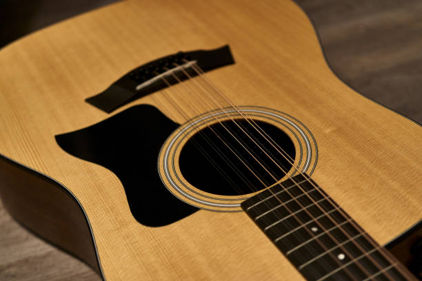 istock Sound hole of a 12-string acoustic guitar 1221115038