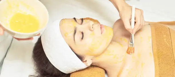 chemic body peel. Cosmetology acne treatment. Young girl at medical spa salon.